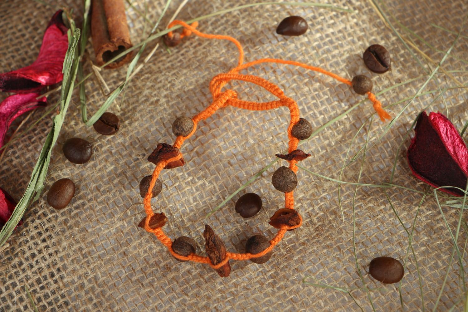 Homemade aroma strand bracelet on an orange rope with coffee beans photo 5