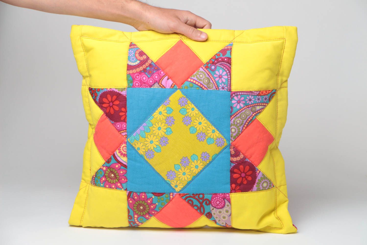 Colorful handmade cotton fabric patchwork cushion of yellow color photo 5