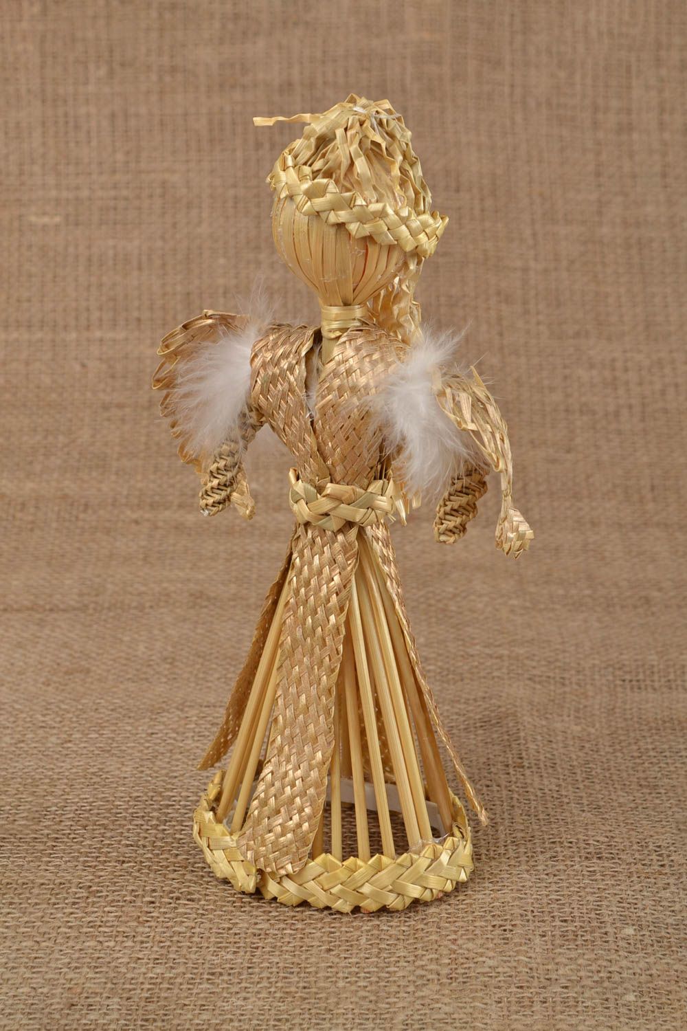 Handmade interior wall hanging woven of straw in the shape of guardian angel photo 1
