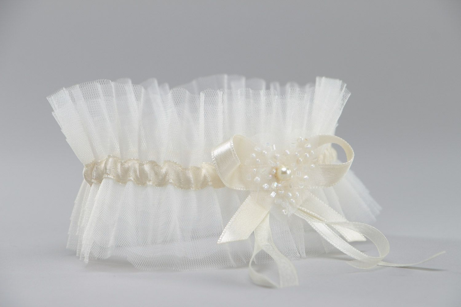 Handmade ivory colored veiling wedding bridal garter with satin ribbon and pearl photo 3