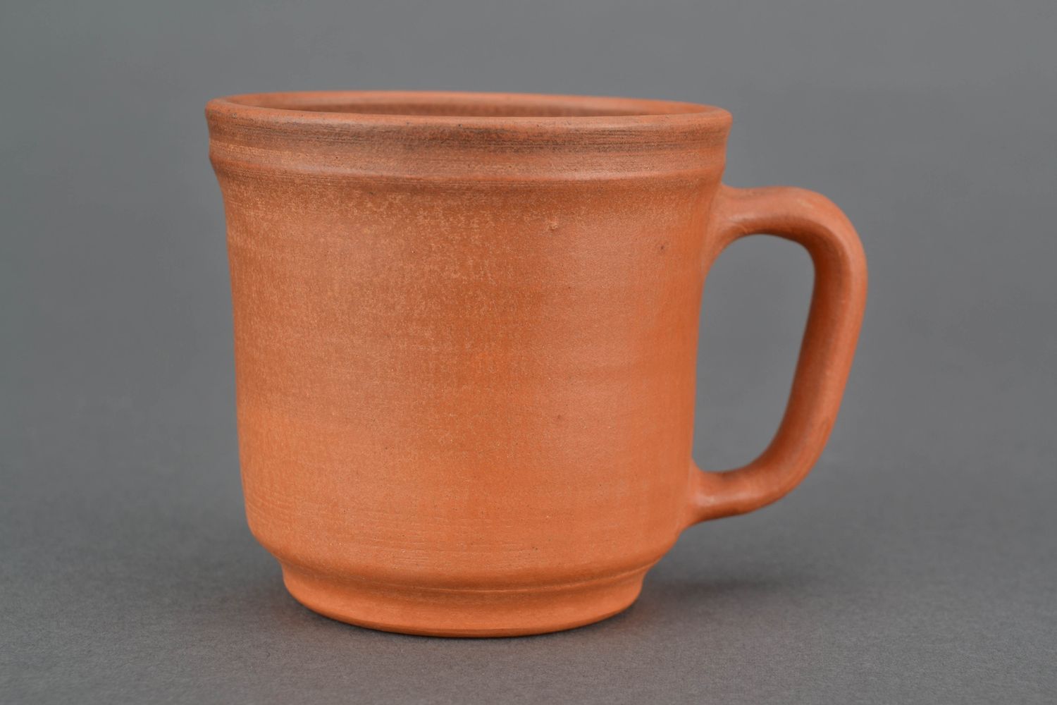 10 oz classic style clay Mexican coffee cup in terracotta color with handle and no pattern photo 1