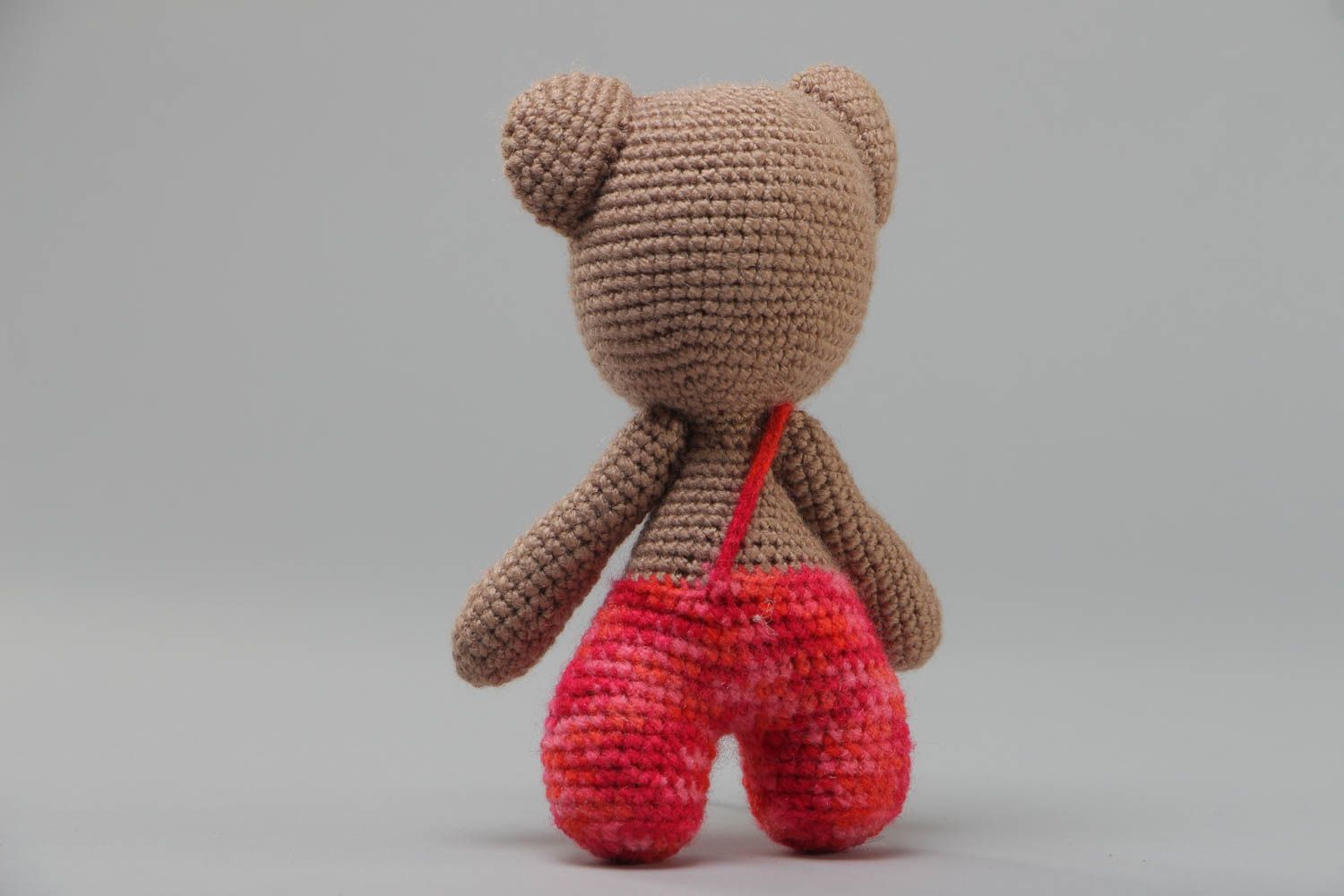 Small handcrafted soft crocheted teddybear for children made using knitting needle photo 4