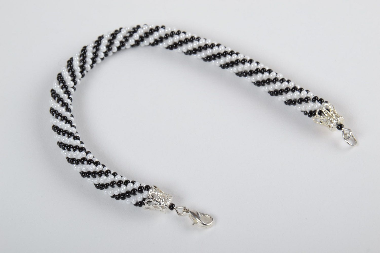 Handmade beautiful wrist bracelet made of Czech beads black and white for women photo 4