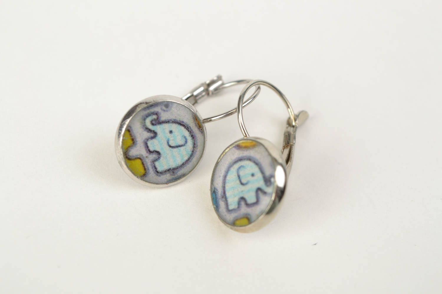 Handmade earrings with decoupage print coated with jewelry resin Elephants photo 1