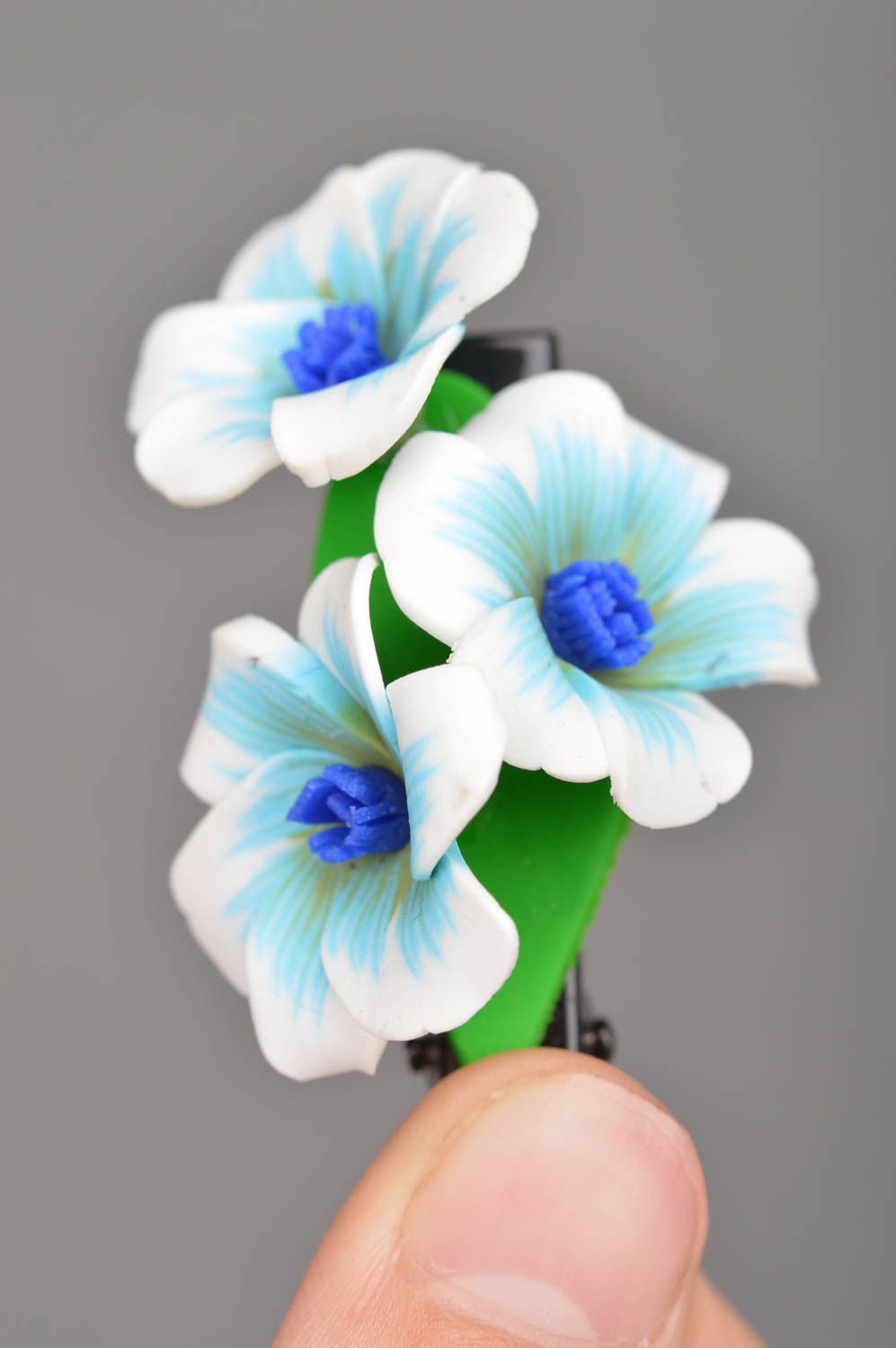 White and blue handmade designer barrette with plastic flowers photo 2
