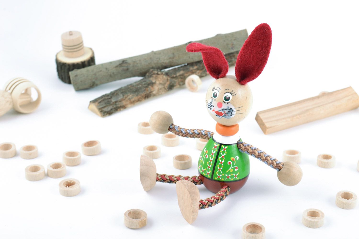Painted eco friendly wooden homemade eco toy rabbit with red ears for children photo 1