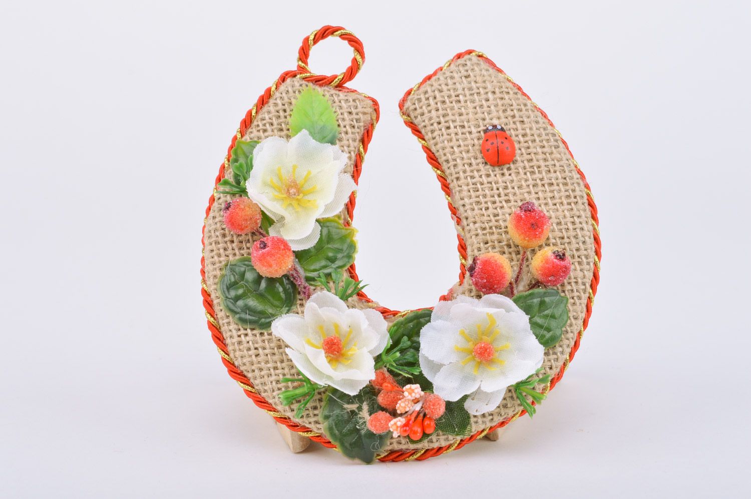 Handmade horseshoe made of burlap with flowers and berries decor and with a loop photo 5