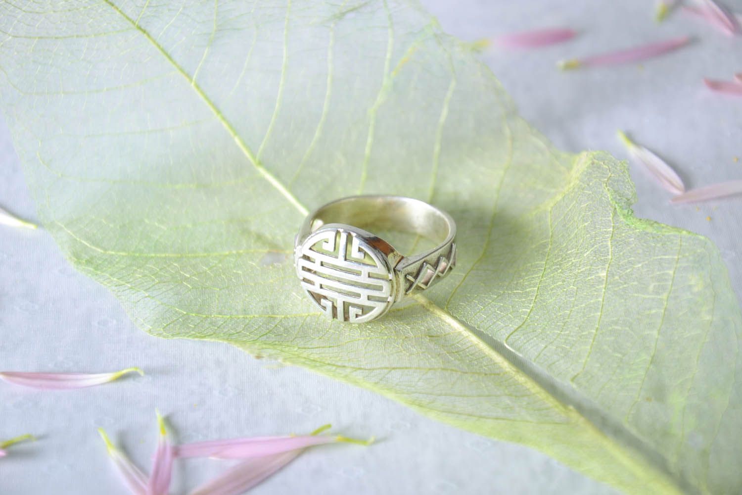 Silver ring with ethnic pattern photo 1