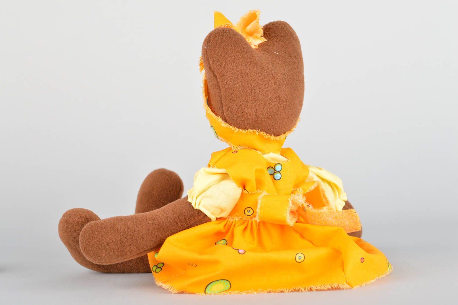 Детская игрушка мягкая из флиса мишка девочка в желтом платье с бантиком фото 2