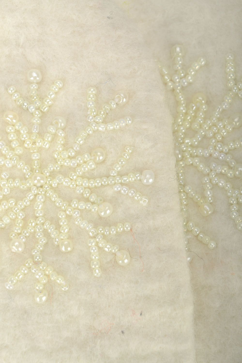 Manoplas tejidas blancas de lana natural foto 5