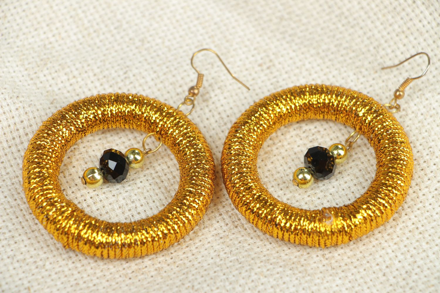 Large hoop earrings of golden color photo 4