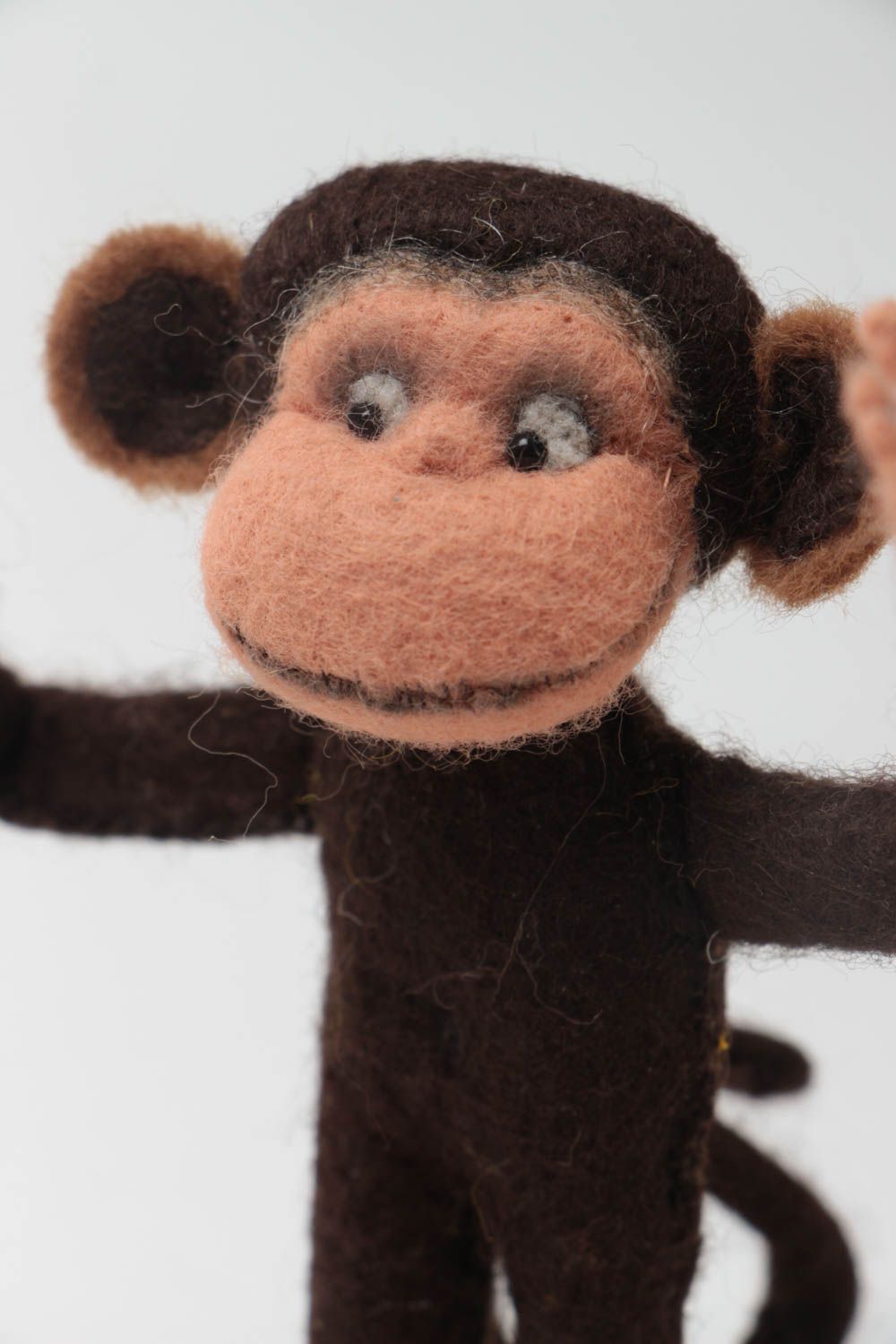 Handmade small designer woolen soft toy charming monkey with banana photo 3
