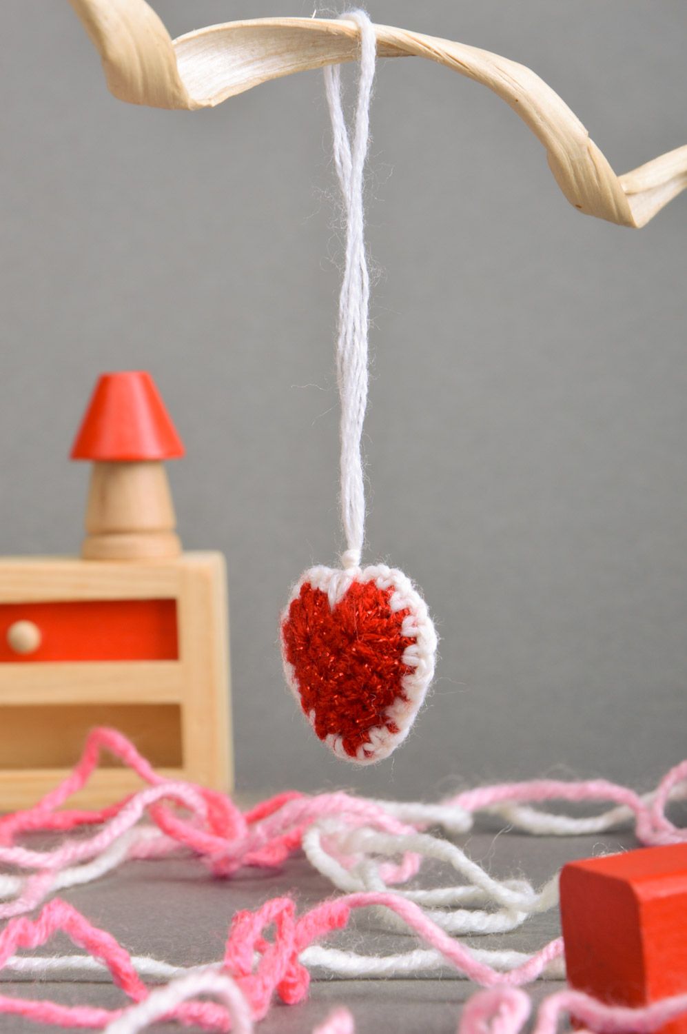 Handmade heart-shaped red and white keychain crocheted of semi-woolen threads photo 1