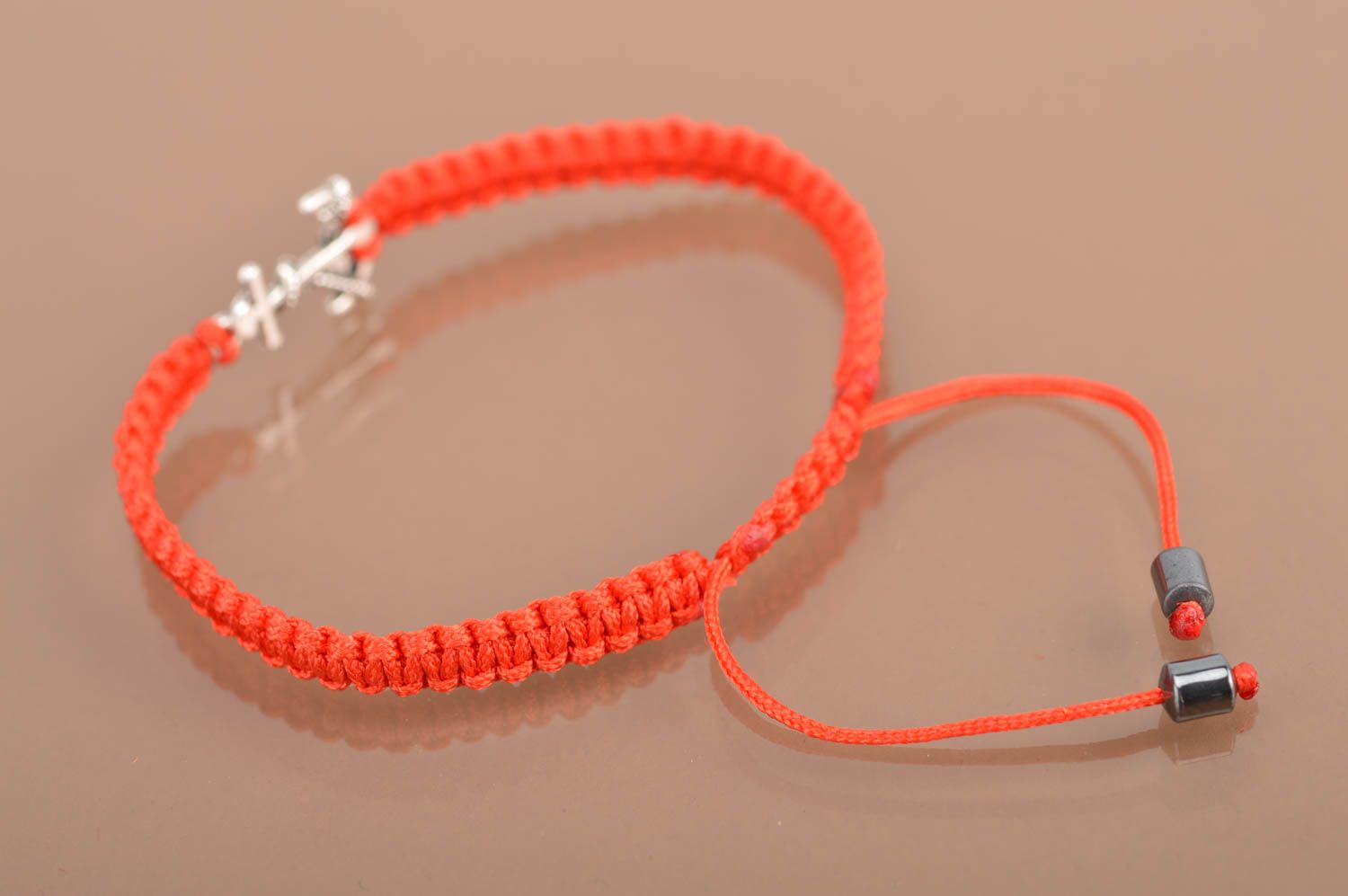 Handmade stylish thin red woven wrist bracelet made of silk with insert photo 5