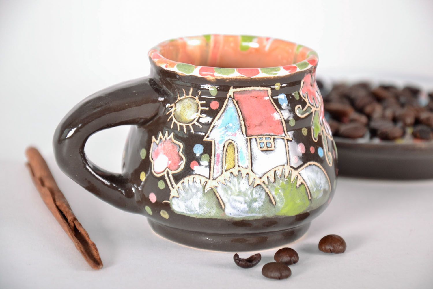 Ceramic coffee cup with handle and glazed with little house pattern photo 1
