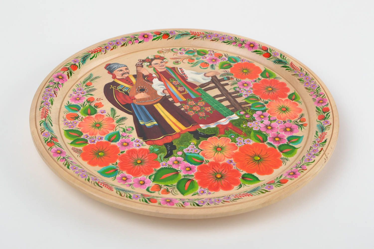 Красивая деревянная тарелка с Петриковской росписью ручной работы круглая фото 1