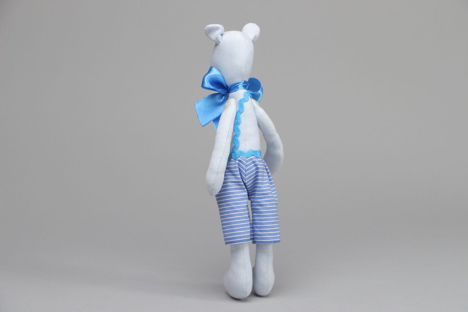 Textile toy bear with bow on the neck photo 3