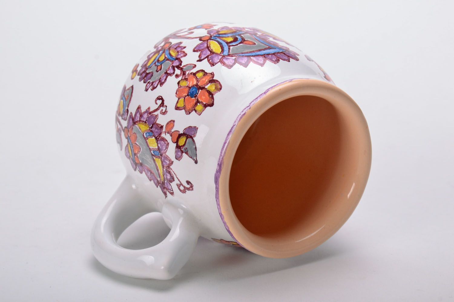Ceramic coffee cup glazed in white and cherry color with flower pattern and handle photo 3