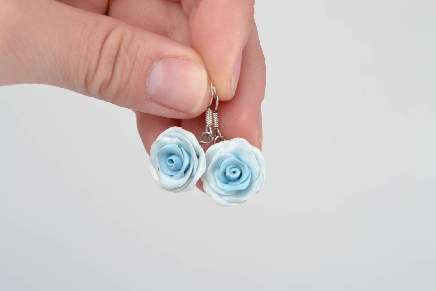 Handmade designer polymer clay earrings in the shape of tender small blue roses photo 2