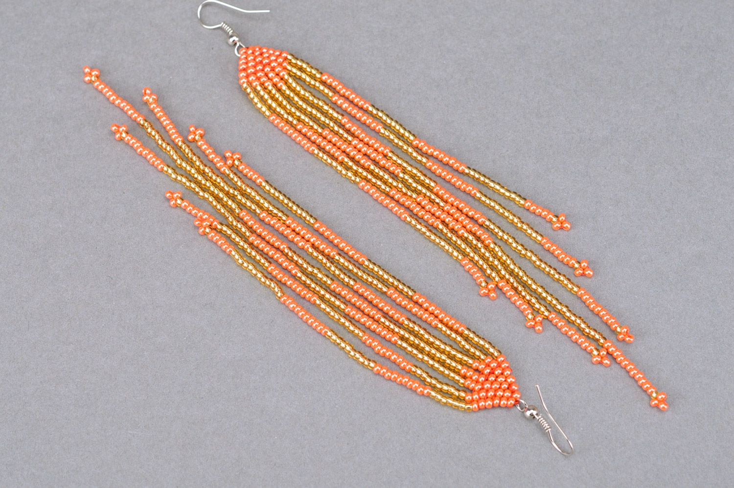 Stylish long handmade beaded earrings with fringe of golden and red colors photo 5