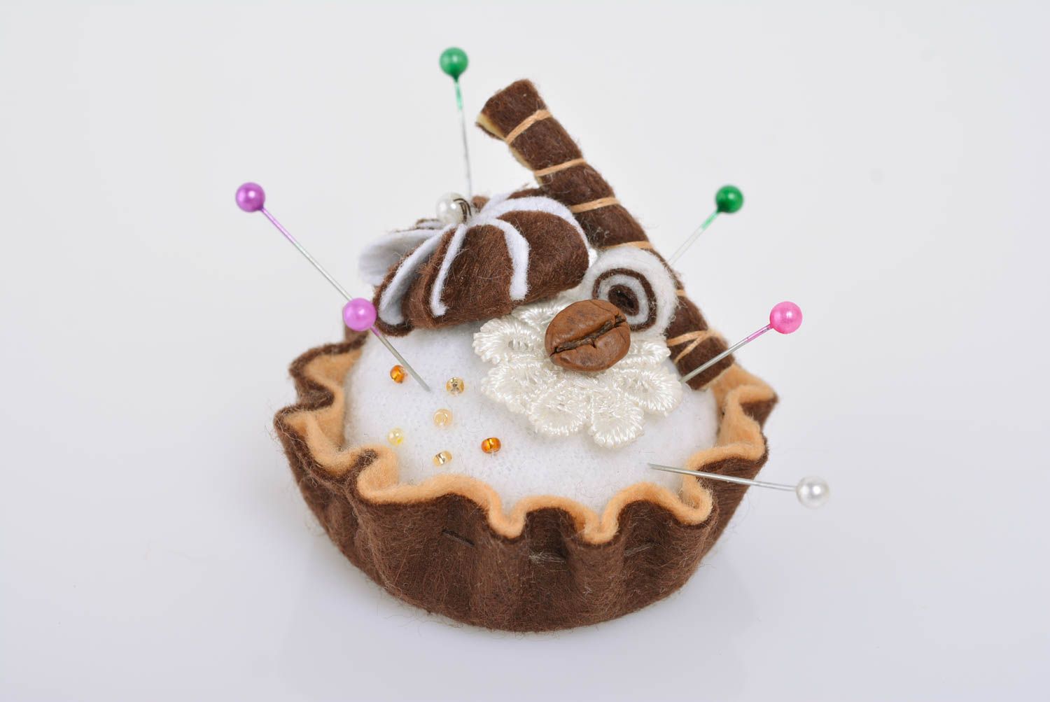 Handmade soft pincushion sewn of felt in the shape of chocolate cake with coffee photo 1