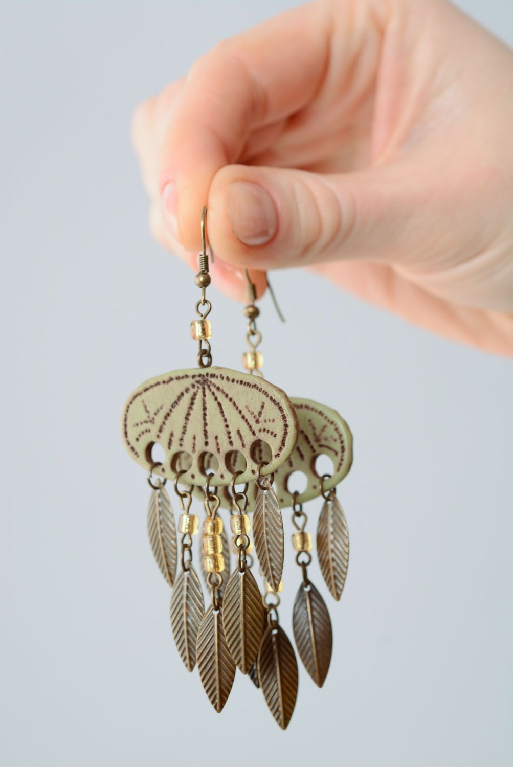 Plastic earrings with charms photo 3