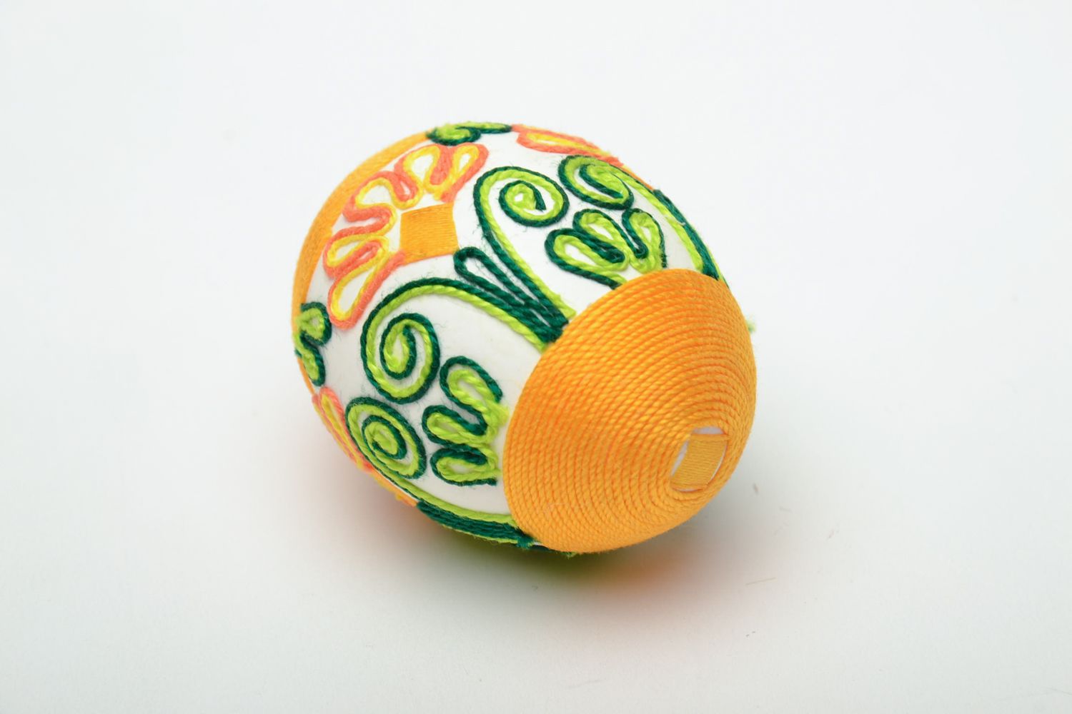 Handmade Easter egg decorated with yellow threads photo 4