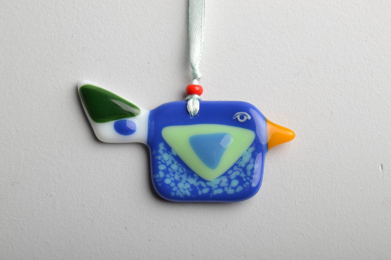 Fusing glass pendant in the shape of bird photo 1
