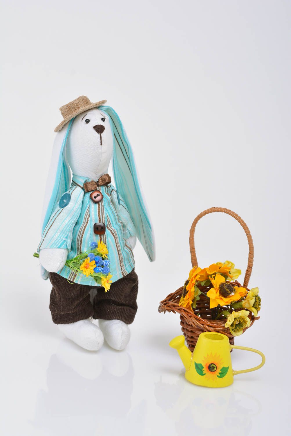 Handmade designer soft toy sewn of cotton rabbit in blue costume with bouquet photo 3