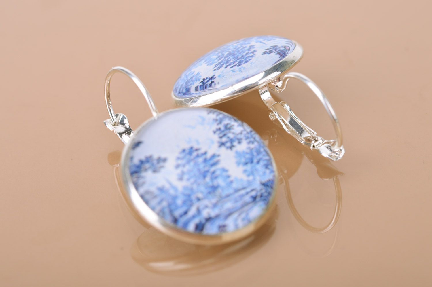 Handmade metal round dangle earrings with landscape print in white and blue colors photo 5
