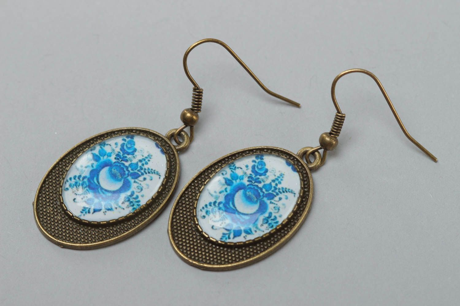Handmade designer oval dangling earrings with metal basis and glass like glaze photo 2
