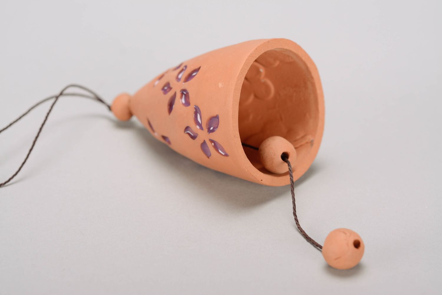 Bells made from red clay with embossment photo 3