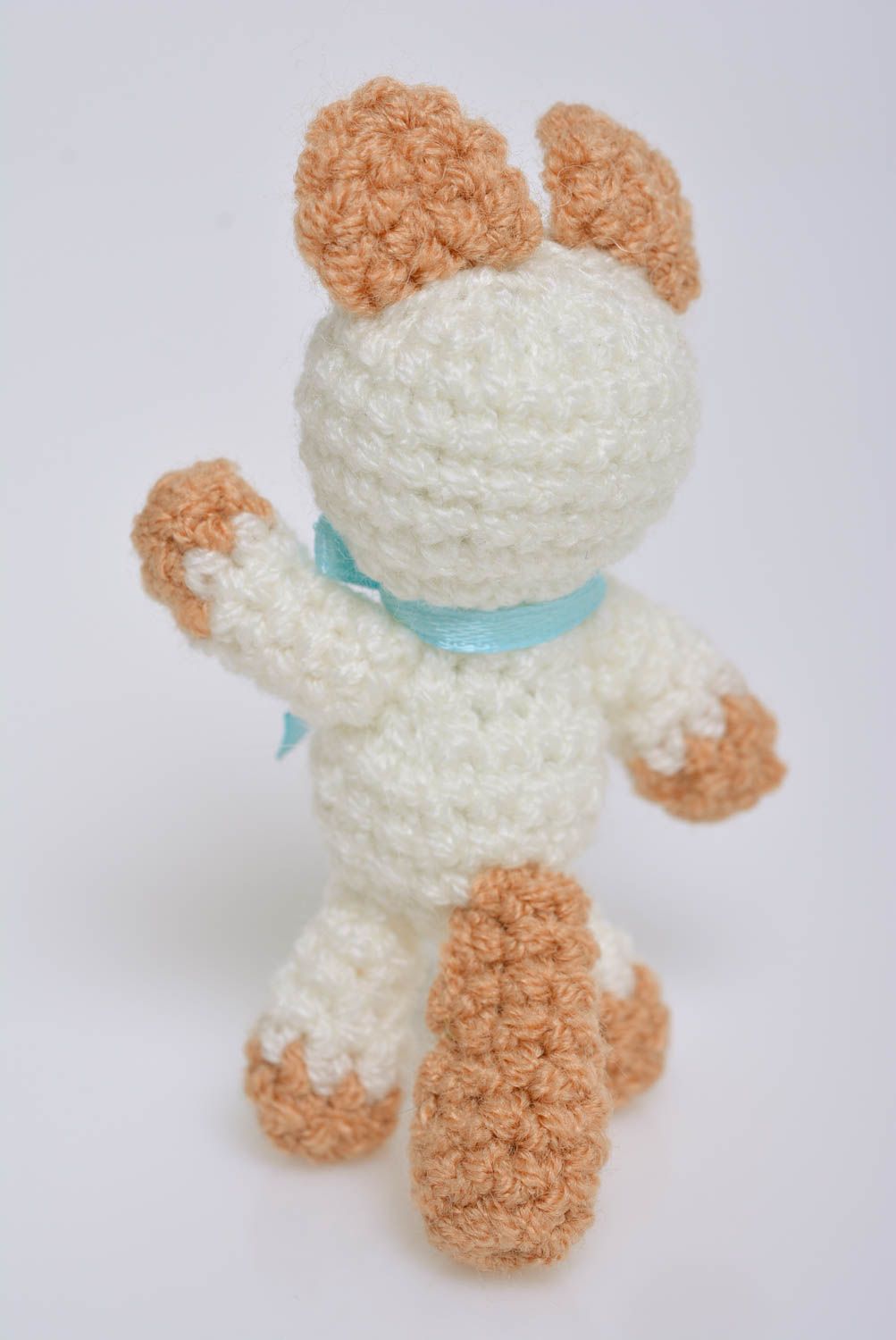 Small white children's handmade soft toy cat crocheted of acrylic threads photo 3