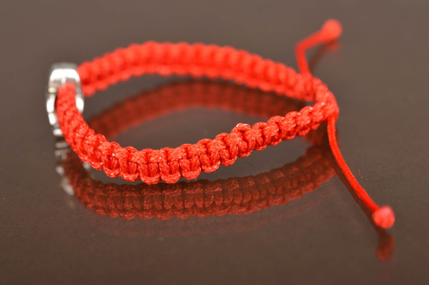 Thin woven stylish unusual red handmade bracelet made of textile laces Man photo 5