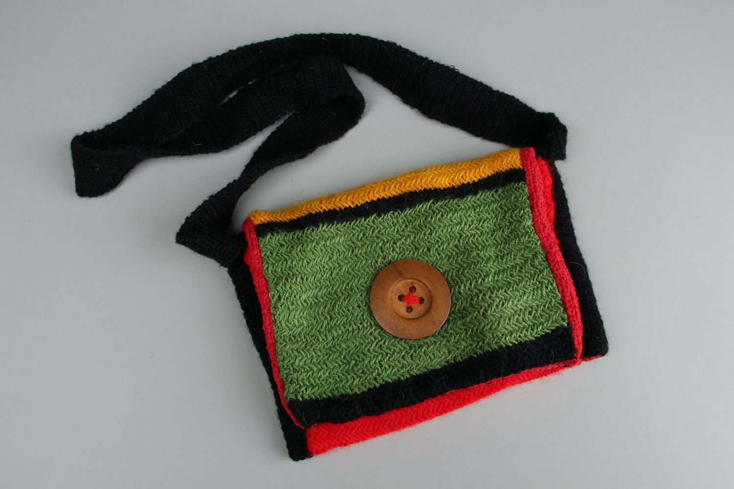 Wool knitted purse with button photo 3