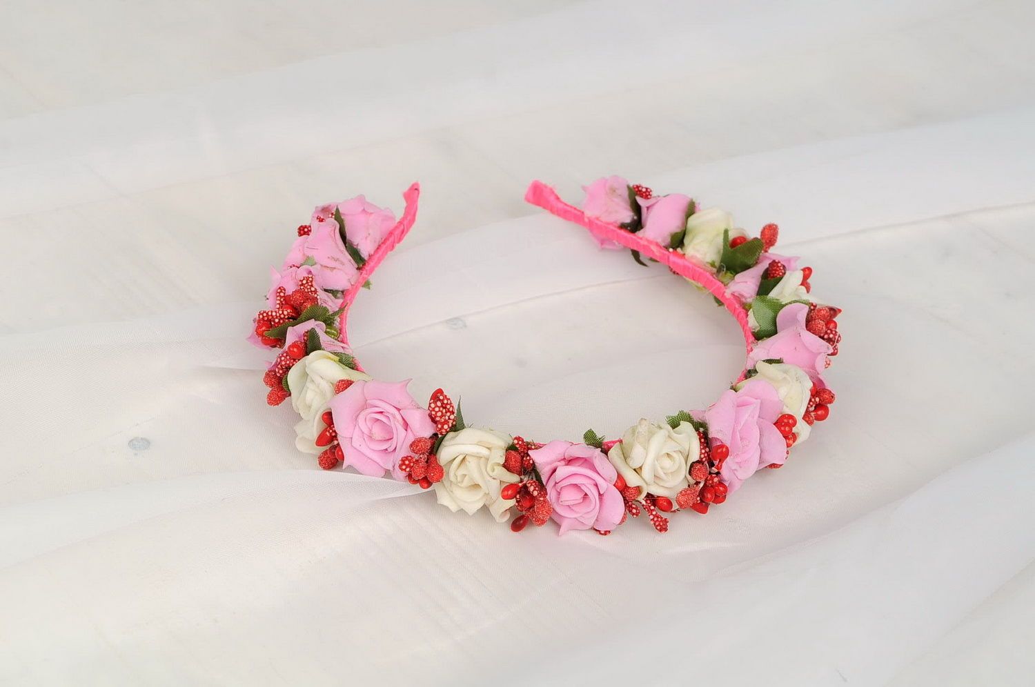Headband with pink artificial flowers photo 4