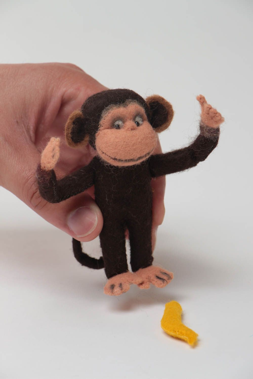 Handmade small designer woolen soft toy charming monkey with banana photo 5