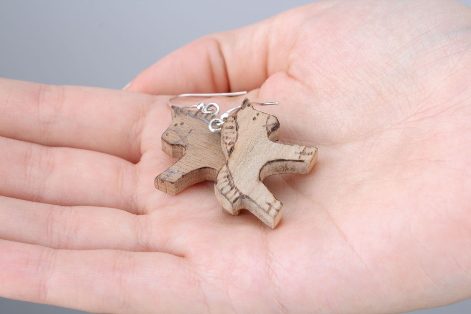 Wooden earrings in the shape of horses photo 2