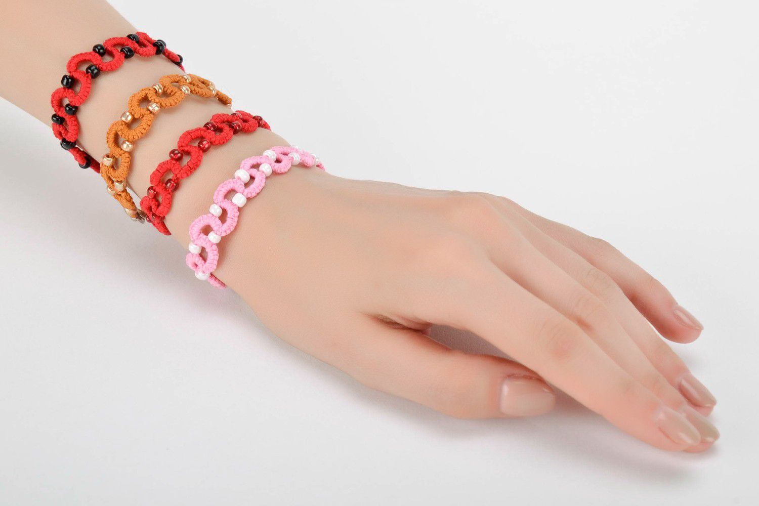 Bracelet braided from cotton threads white and pink photo 5