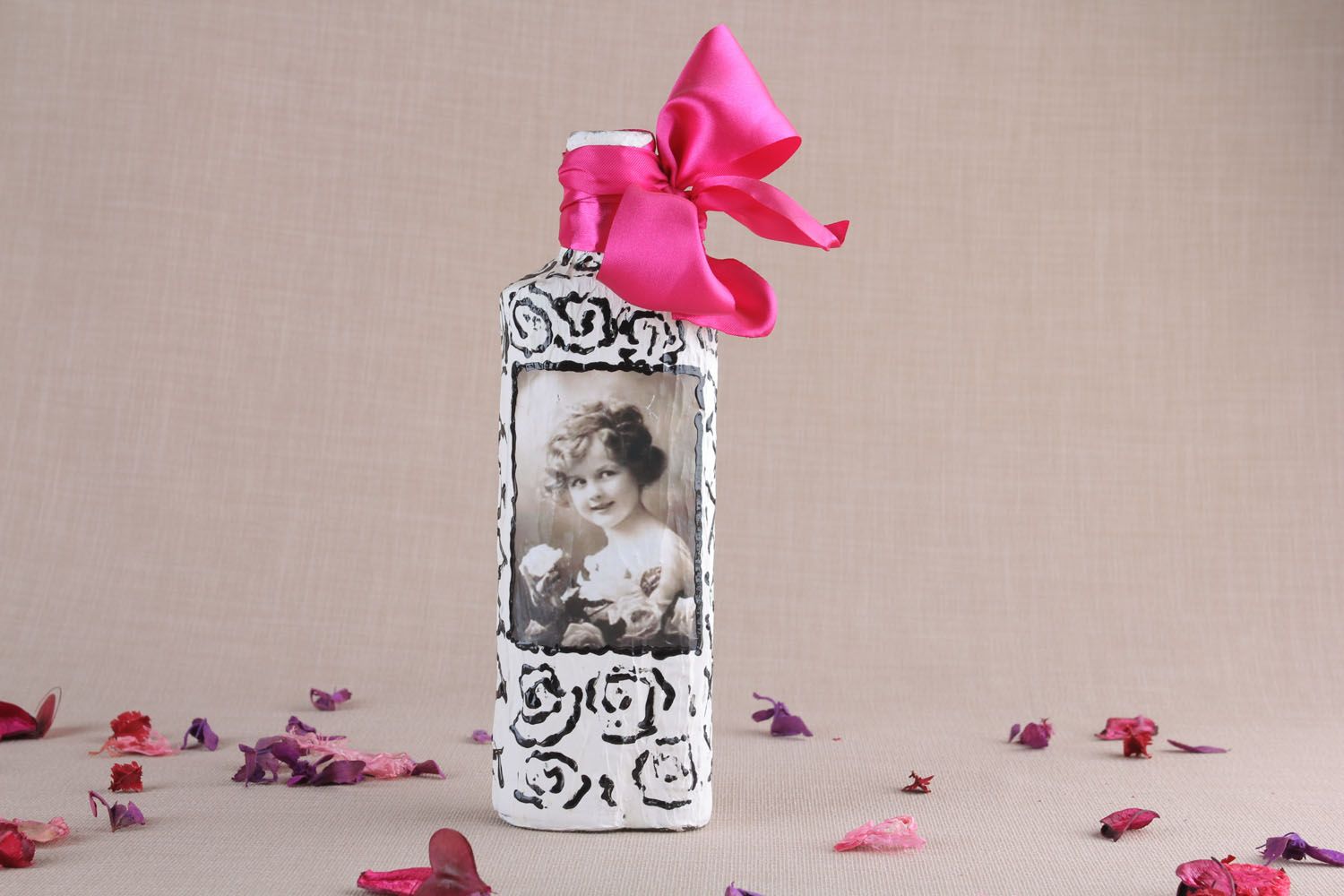Glass bottle decorated with decoupage photo 1