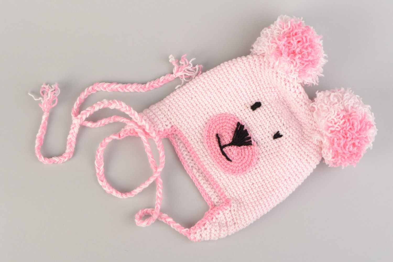 Handmade hat crocheted of hypoallergenic acrylics in the shape of pink bear photo 1