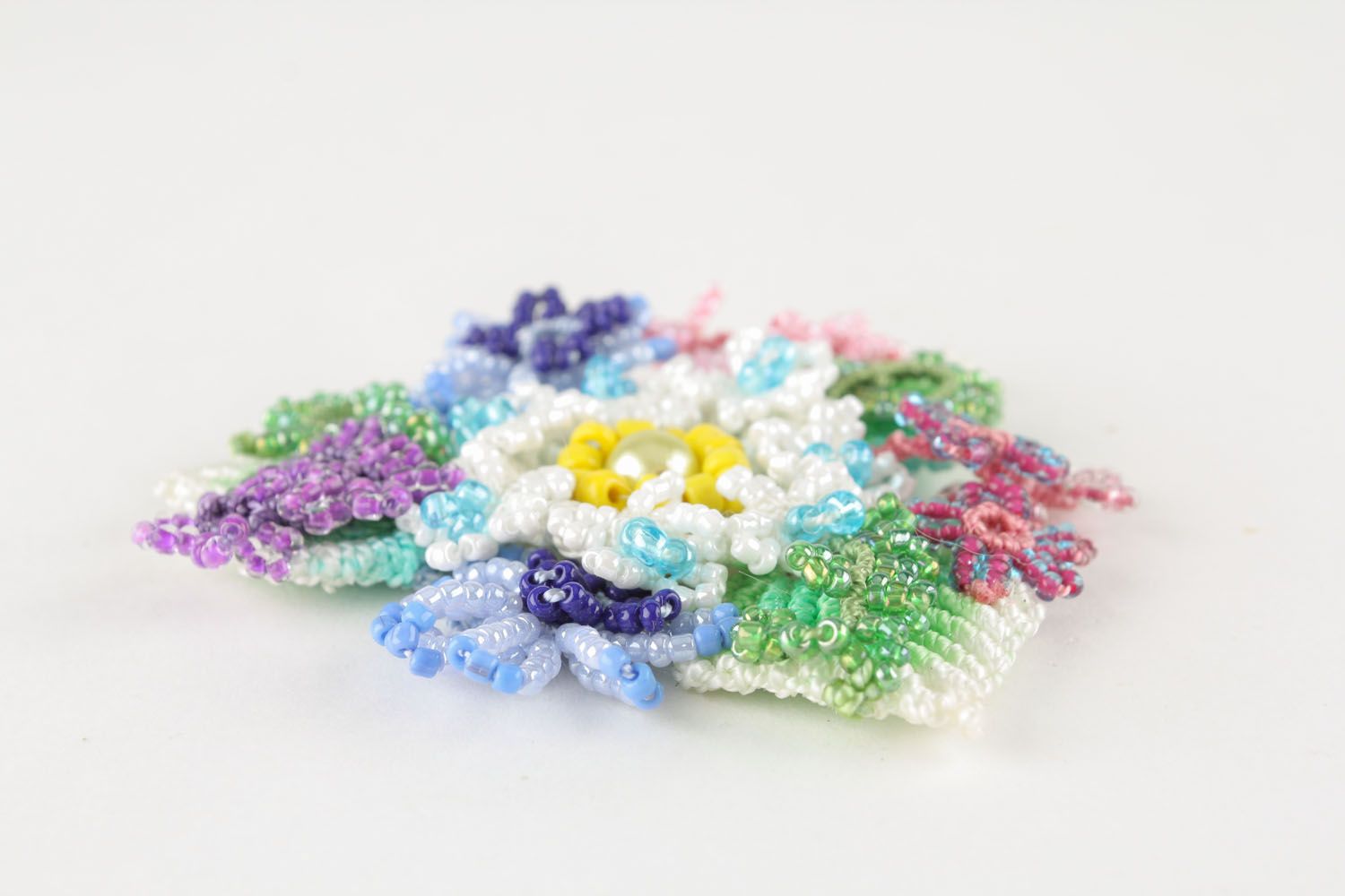 Brooch made of threads and beads photo 3