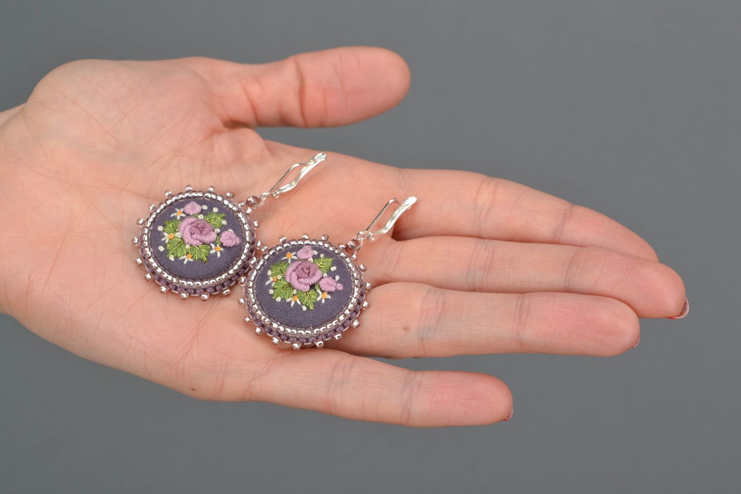 Satin stitch embroidered earrings on leather basis photo 2