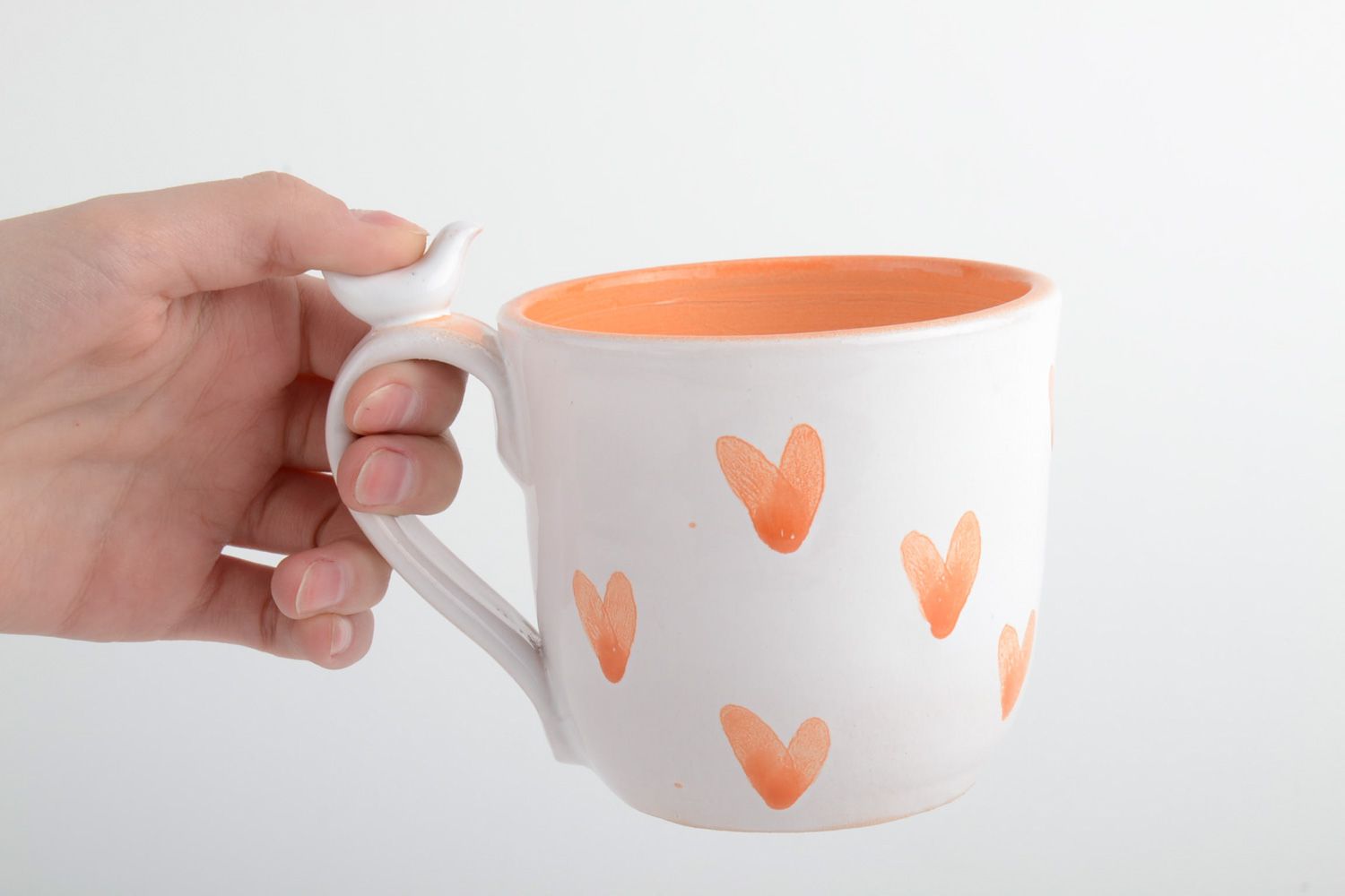 White and orange colors heart pattern ceramic cup for tea with handle photo 5