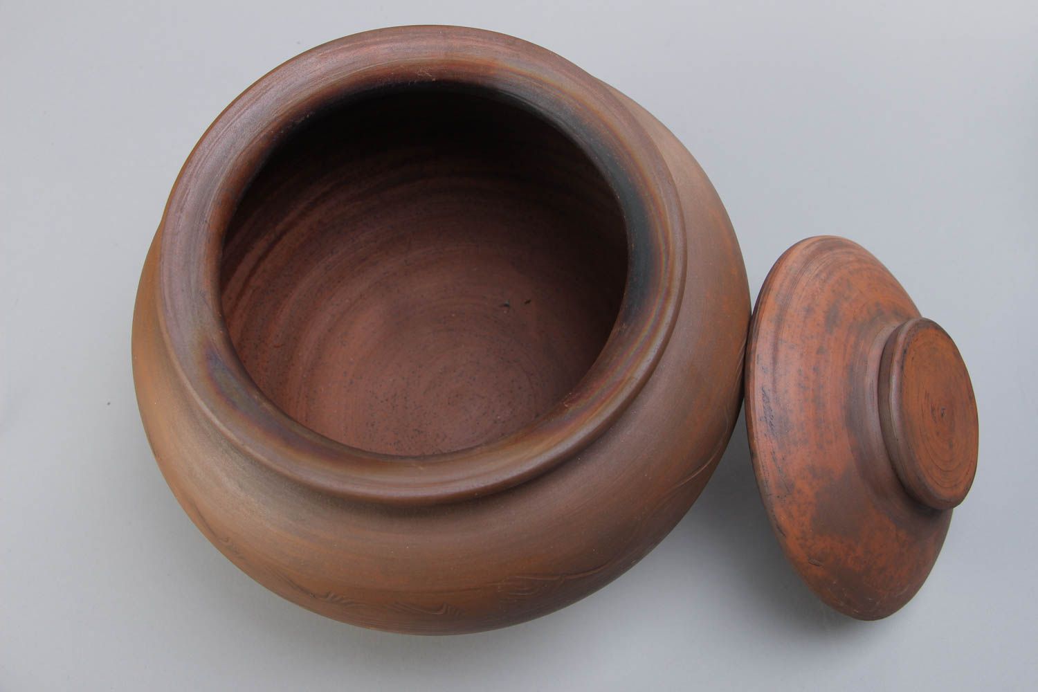 Handmade dark brown ceramic pot with lid for baking of middle size for 2 l photo 3