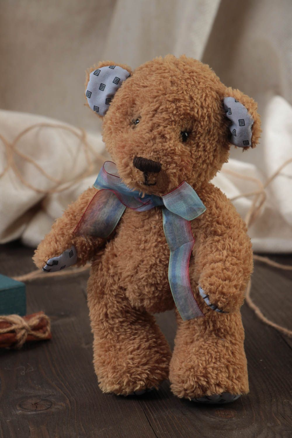 Handmade designer soft toy beige bear with blue bow for children photo 1