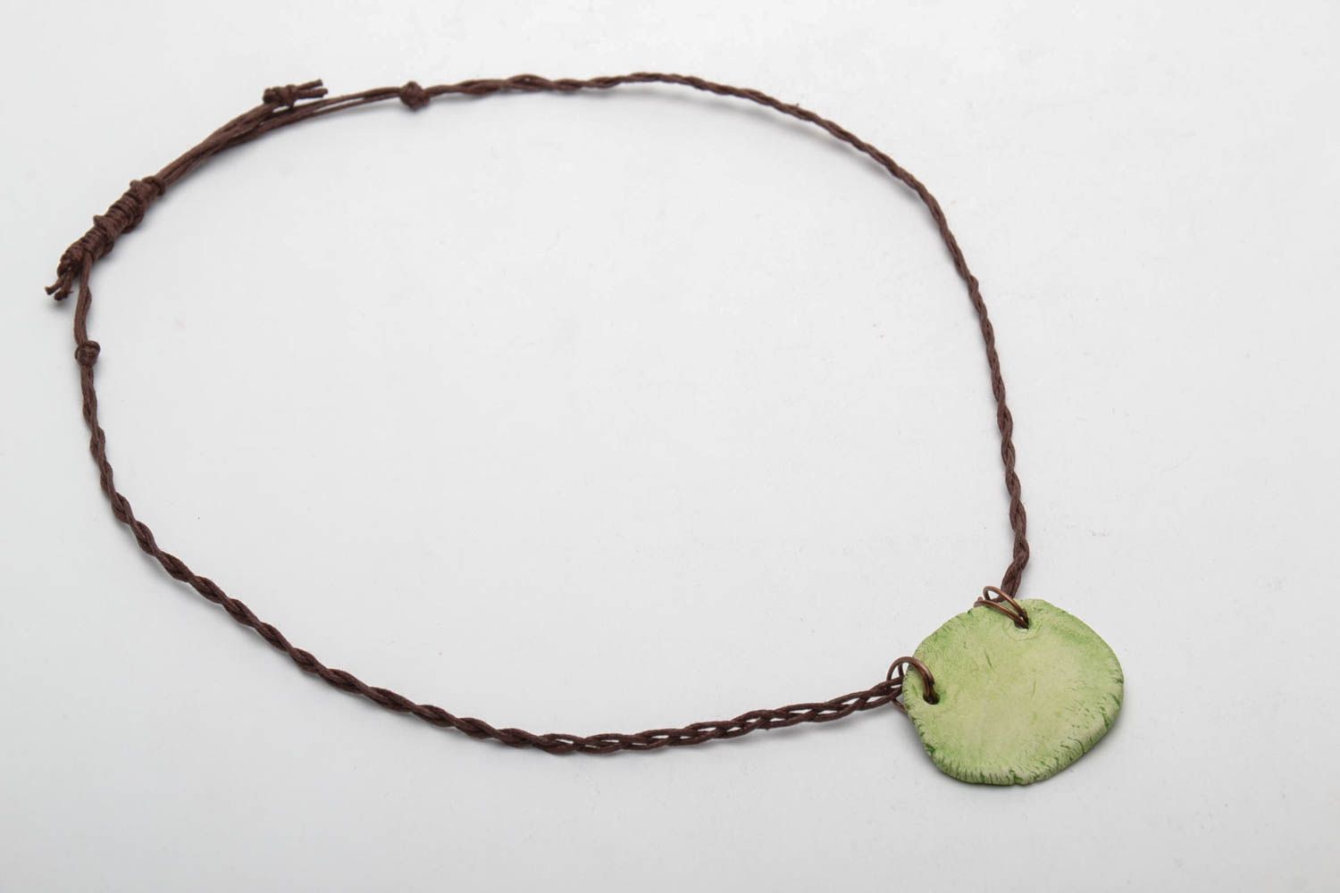 Clay pendant with cord photo 5