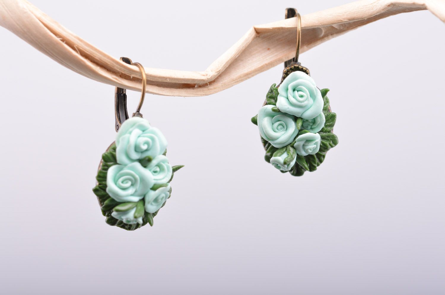 Elegant handmade polymer clay flower earrings of mint color photo 2