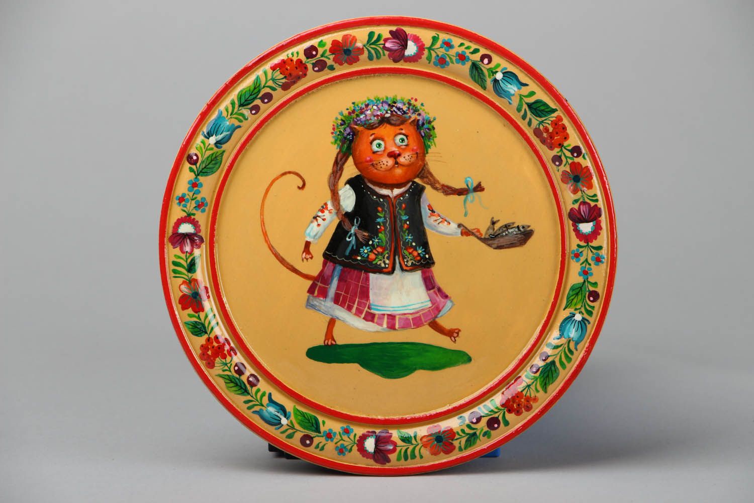 Decorative plate with Petrikov painting photo 1
