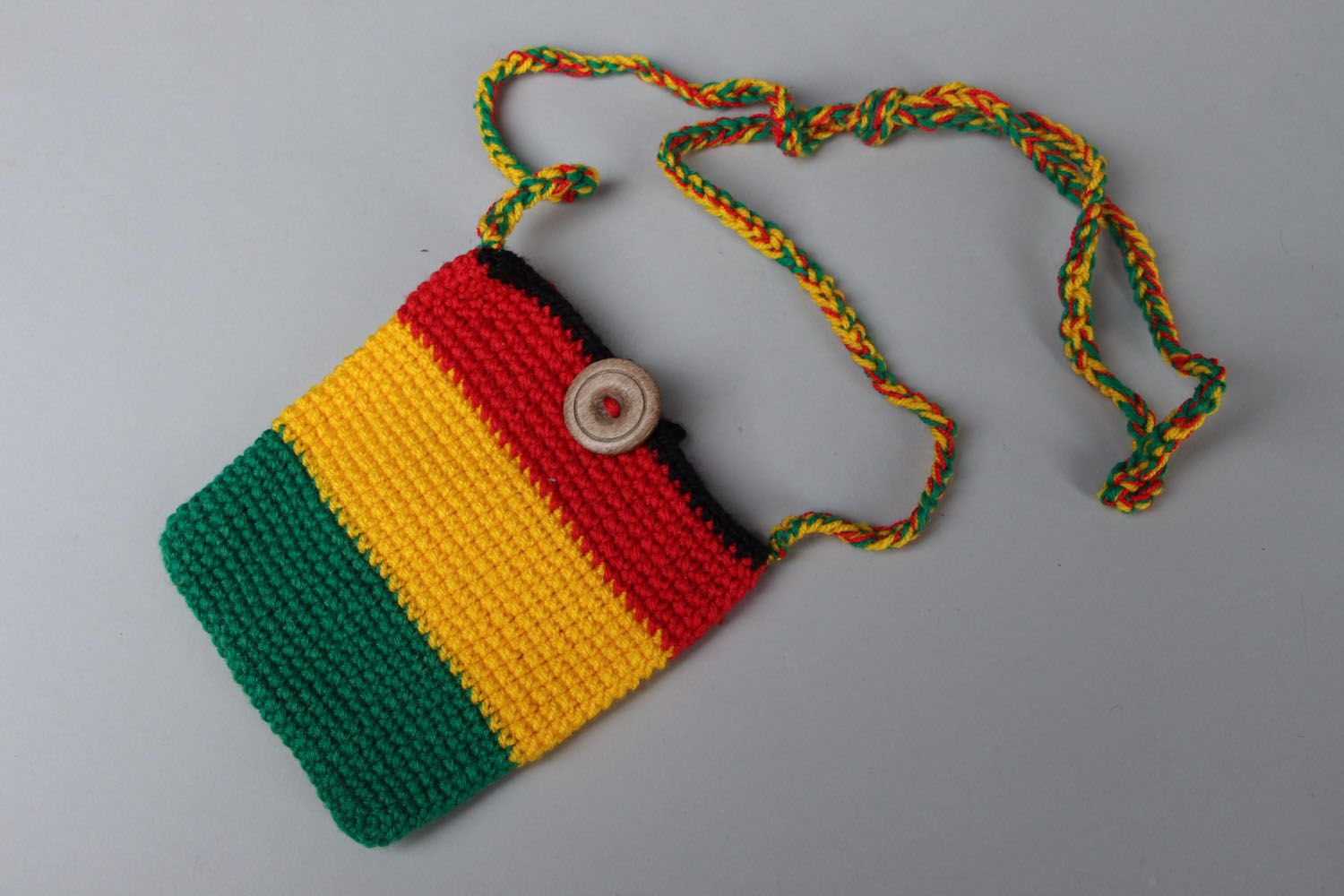 Crochet purse in rasta style photo 1